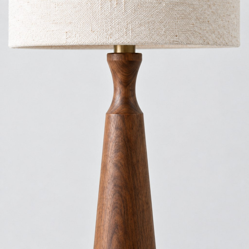 Close up of the walnut grain and fabric shade of the Harlow table lamp