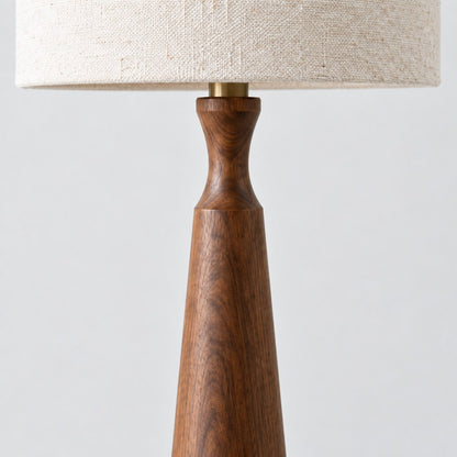 Close up of the walnut grain and fabric shade of the Harlow table lamp